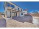 A view of the home's backyard, including the patio, rear exterior, and space for landscaping at 1320 Crimson Sunbird Ave, North Las Vegas, NV 89084