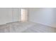 Carpeted bedroom featuring double closets and white trim at 1320 Crimson Sunbird Ave, North Las Vegas, NV 89084