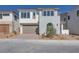 Charming two-story home featuring a two car garage, neutral stucco, and well manicured landscaping at 1320 Crimson Sunbird Ave, North Las Vegas, NV 89084