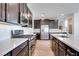 Modern gourmet kitchen with stainless steel appliances and custom cabinets at 1320 Crimson Sunbird Ave, North Las Vegas, NV 89084