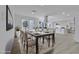 Elegant dining room featuring modern decor, stylish furnishings, and abundant natural light at 2108 Plaza Del Dios, Las Vegas, NV 89102