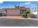 Charming single-story home with a two-car garage and well-maintained landscaping at 2108 Plaza Del Dios, Las Vegas, NV 89102
