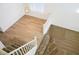 Entryway featuring stylish wood floors, a staircase, and a modern chandelier at 2204 Ambermill Ct, Henderson, NV 89052