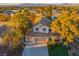 Charming two-story home with a three-car garage and a well-manicured front yard at 2204 Ambermill Ct, Henderson, NV 89052