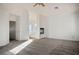 Bright living room featuring neutral carpet, a fireplace, and an attached bathroom at 2204 Ambermill Ct, Henderson, NV 89052