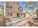 View of the backyard showing a stone patio and a built in barbeque at 2340 Hunt Club St, Las Vegas, NV 89128