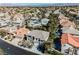 Beautiful aerial perspective of the property showcasing its mature landscaping and neighborhood at 2493 Ram Crossing Way, Henderson, NV 89074