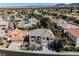 Stunning aerial shot of the home surrounded by lush greenery in a beautiful neighborhood at 2493 Ram Crossing Way, Henderson, NV 89074