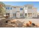 Back of house featuring stucco exterior, foliage, and various yard items at 2493 Ram Crossing Way, Henderson, NV 89074