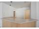 Spacious bar area with light wood cabinets and views into the next room at 2493 Ram Crossing Way, Henderson, NV 89074