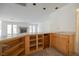 Spacious bar area with open shelves, storage drawers, and a sink at 2493 Ram Crossing Way, Henderson, NV 89074