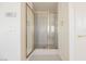 Walk-in shower with glass doors in an updated bathroom at 2493 Ram Crossing Way, Henderson, NV 89074