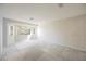 Bright bedroom with wallpaper, a window, and carpet flooring throughout at 2493 Ram Crossing Way, Henderson, NV 89074
