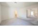 Spacious bedroom with neutral walls, carpet, and doorways to other rooms in the home at 2493 Ram Crossing Way, Henderson, NV 89074