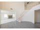 Spacious entryway featuring open staircase and views into the adjacent living spaces at 2493 Ram Crossing Way, Henderson, NV 89074