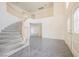 Grand entryway featuring open staircase with a decorative railing at 2493 Ram Crossing Way, Henderson, NV 89074