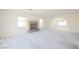 Large living room with fireplace and adjacent sitting area at 2493 Ram Crossing Way, Henderson, NV 89074