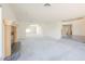 Large living room featuring a fireplace and seamless transitions to the foyer at 2493 Ram Crossing Way, Henderson, NV 89074
