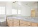 Bathroom featuring dual sinks, lots of counterspace, and a vanity at 2493 Ram Crossing Way, Henderson, NV 89074