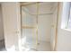 Bright shower with gold frame and light tile surround at 2493 Ram Crossing Way, Henderson, NV 89074