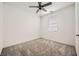 Cozy bedroom with plush carpet flooring, neutral wall color, and bright natural light at 3004 Moulin Heights St, Las Vegas, NV 89156