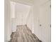 Inviting home entryway featuring beautiful hardwood flooring and crisp white walls at 3004 Moulin Heights St, Las Vegas, NV 89156