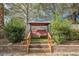 Inviting backyard featuring a charming porch swing, perfect for relaxing in the serene outdoor space at 3213 Oyster Bay St, Las Vegas, NV 89117