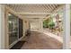 Spacious covered patio with brick flooring, ideal for outdoor dining and relaxing at 3213 Oyster Bay St, Las Vegas, NV 89117