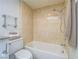 Cozy bathroom featuring a shower and bath combination with neutral tiling, providing a spa-like experience at 3251 Southridge Ave, Las Vegas, NV 89121