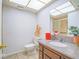 Bathroom featuring granite countertop, decorative elements, with a view of the shower at 3251 Southridge Ave, Las Vegas, NV 89121