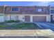 Charming townhome featuring a unique roof, complemented by a well-kept lawn and a welcoming front entrance at 3251 Southridge Ave, Las Vegas, NV 89121