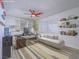 An office space offering both work and relaxation areas with built-in shelving and modern décor at 3251 Southridge Ave, Las Vegas, NV 89121