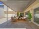 Covered patio with stylish outdoor furniture, perfect for relaxing or entertaining guests at 3251 Southridge Ave, Las Vegas, NV 89121