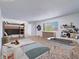Staged room with play and sleeping areas, neutral carpet and light paint at 3251 Southridge Ave, Las Vegas, NV 89121