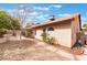 Low maintenance backyard featuring desert landscaping, walkway, and private patio perfect for outdoor entertaining at 3901 W Red Coach Ave, North Las Vegas, NV 89031