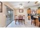 Open dining area connects to the kitchen, featuring a sliding door to the outside at 3901 W Red Coach Ave, North Las Vegas, NV 89031