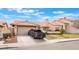 Inviting single-story home with a well-manicured lawn, neutral paint, and convenient attached garage at 3901 W Red Coach Ave, North Las Vegas, NV 89031