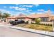 Attractive single-story home with a lush front lawn, neutral paint, and convenient attached garage at 3901 W Red Coach Ave, North Las Vegas, NV 89031