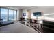 Bright modern bedroom with a king bed, comfortable seating, great light, and city views at 4381 W Flamingo Rd # 3303, Las Vegas, NV 89103