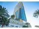 A modern high-rise building adorned with 'Palms Place' signage framed by palm trees at 4381 W Flamingo Rd # 3303, Las Vegas, NV 89103