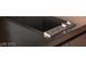 A close-up of a modern, built-in cooktop with sleek design and easy-to-use controls at 4381 W Flamingo Rd # 3303, Las Vegas, NV 89103