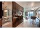 Open floor plan showcasing a gourmet kitchenette, sleeping area, and modern bathroom with stunning city views at 4381 W Flamingo Rd # 3303, Las Vegas, NV 89103