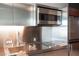 Modern kitchenette featuring stainless steel appliances and fixtures at 4381 W Flamingo Rd # 3303, Las Vegas, NV 89103