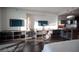 Sunlit living area features media center, workspace, and seamless flow to the kitchenette at 4381 W Flamingo Rd # 3303, Las Vegas, NV 89103