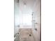 Modern tiled shower with a glass door and modern fixtures at 4381 W Flamingo Rd # 3303, Las Vegas, NV 89103