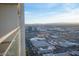 Expansive city views from high-rise balcony overlooking the cityscape and distant mountains at 4381 W Flamingo Rd # 3303, Las Vegas, NV 89103