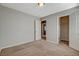 Bedroom view showcasing carpeting, closet, and doorway to another room at 5309 Tartan Hill Ave, Las Vegas, NV 89141