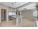 Modern kitchen island with bar seating, stainless steel appliances, and open layout at 5309 Tartan Hill Ave, Las Vegas, NV 89141