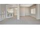 Open living room featuring neutral carpet and wide doorways to other rooms at 5309 Tartan Hill Ave, Las Vegas, NV 89141