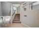 Staircase with carpeted stairs and white railings leading to the upper level at 5309 Tartan Hill Ave, Las Vegas, NV 89141
